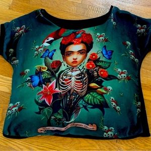 Artisan made graphic top. Visually striking, vivid colors. Comfortable to wear.